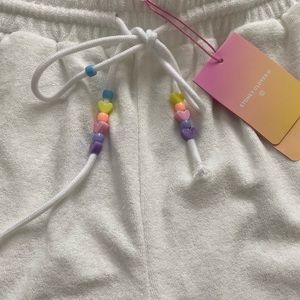 Brand new! Stoney Clover white terry cloth pants w/ adorable bead drawstrings.